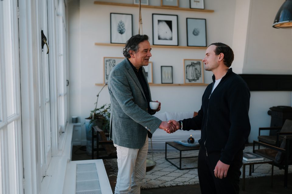 Adviser and entrepreneur in discussion at the meeting table